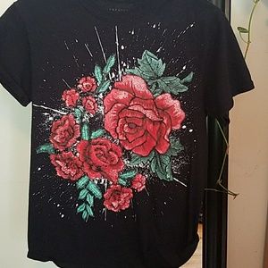 painted on roses on black top